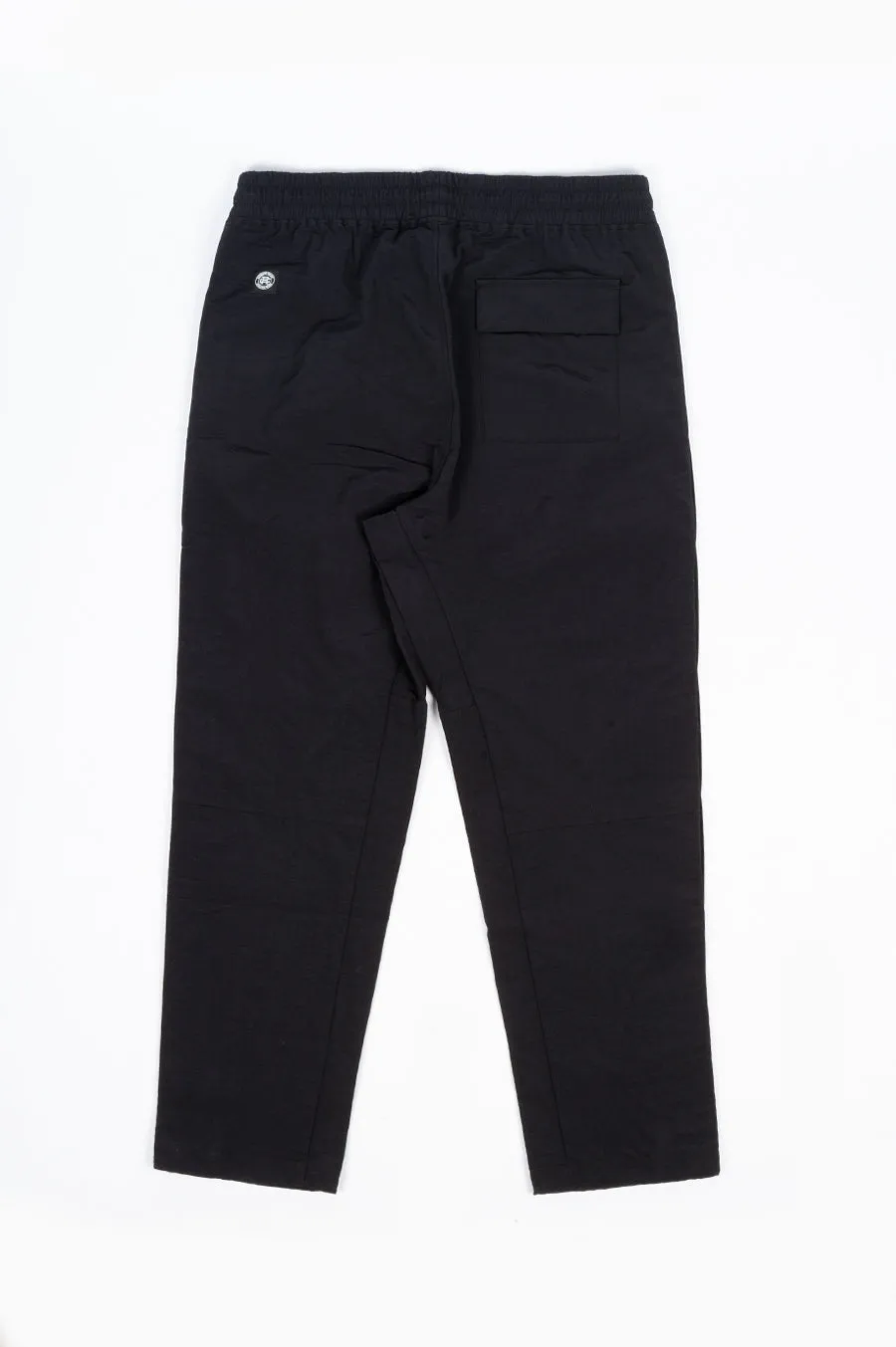 REIGNING CHAMP X JIDE OSIFESO WOVEN NYLON TEAR AWAY PANT BLACK